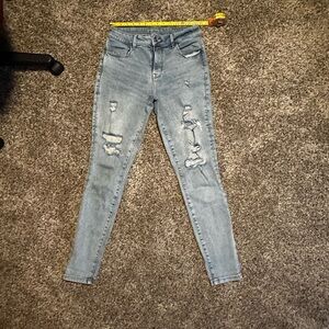 Women's Light Blue Distressed Jeans